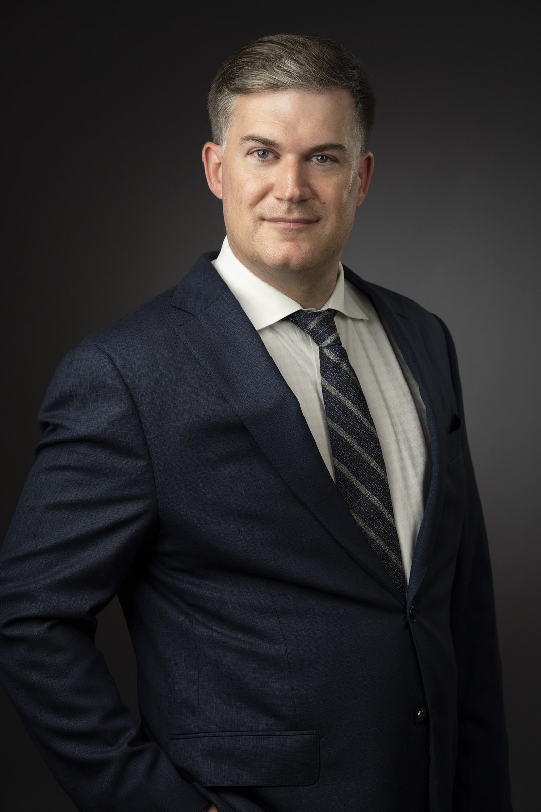 A polished studio business portrait by Len Marks Photography