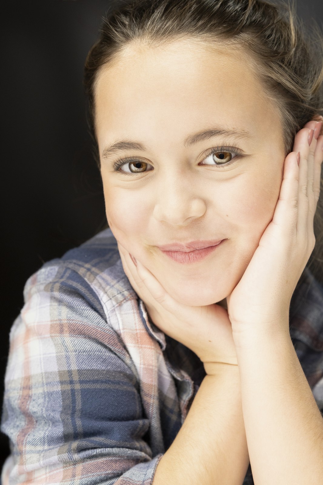 A natural, unguarded smile captured by Len Marks Photography