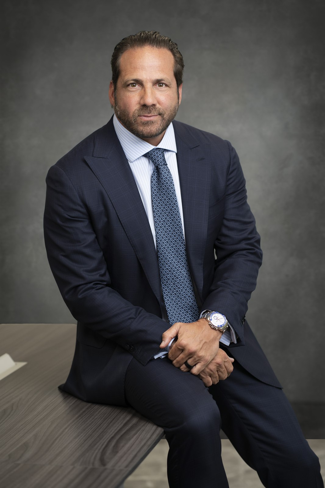 A confident business headshot for a Long Island law office by Len Marks Photography